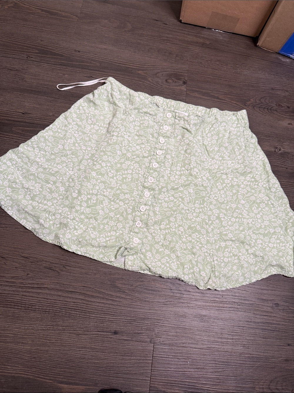 Light green and white floral button up front skirt